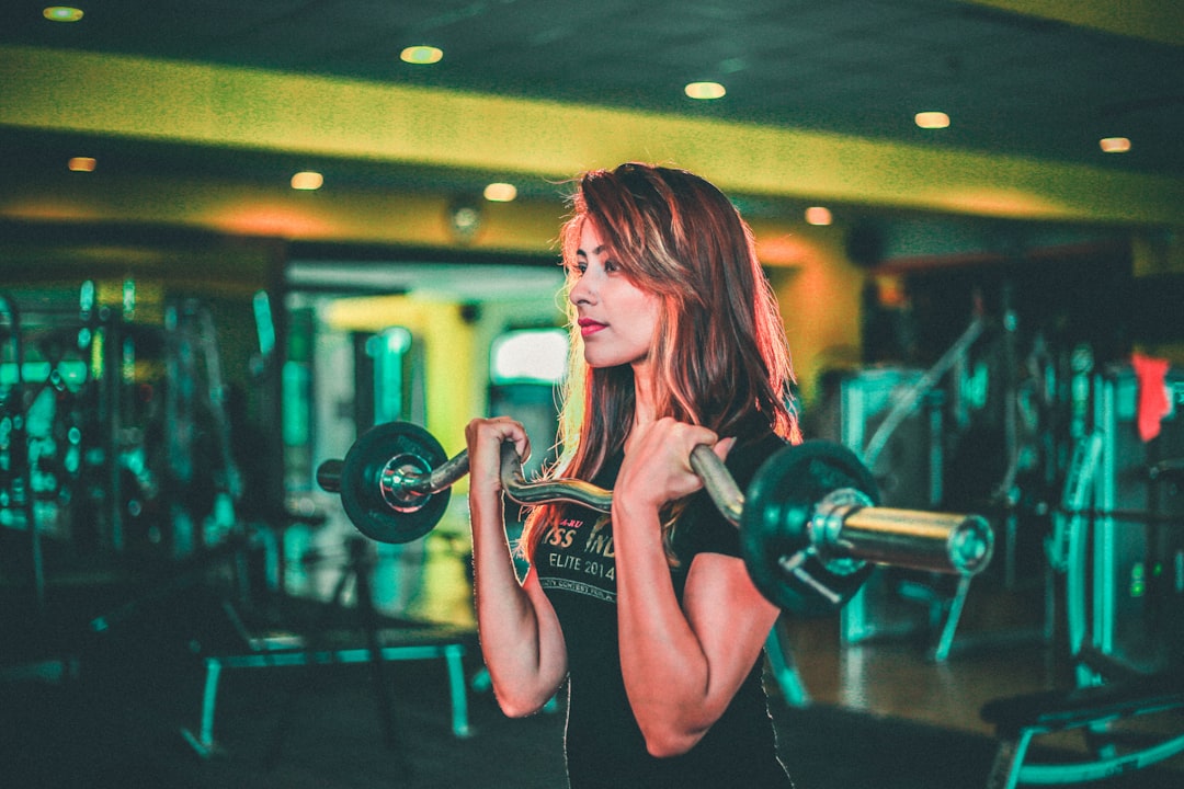 Person performing strength training exercises for longevity and healthy aging