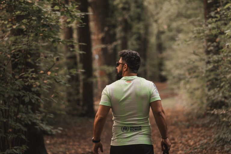 Fit man over 40 running outdoors to support heart health after 40