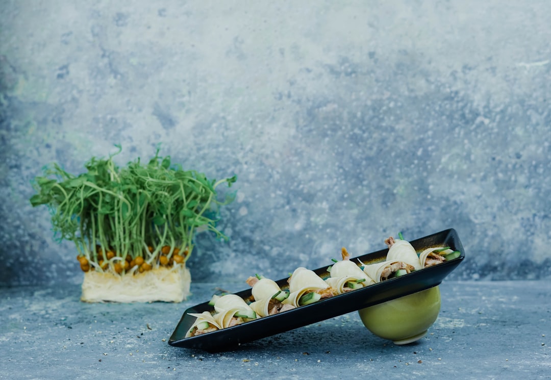 Fresh broccoli sprouts and whole grains representing sulforaphane vs spermidine for longevity