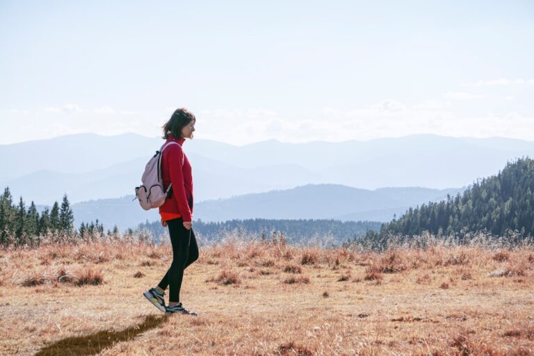 Woman walking briskly outdoors as part of a walking speed longevity test