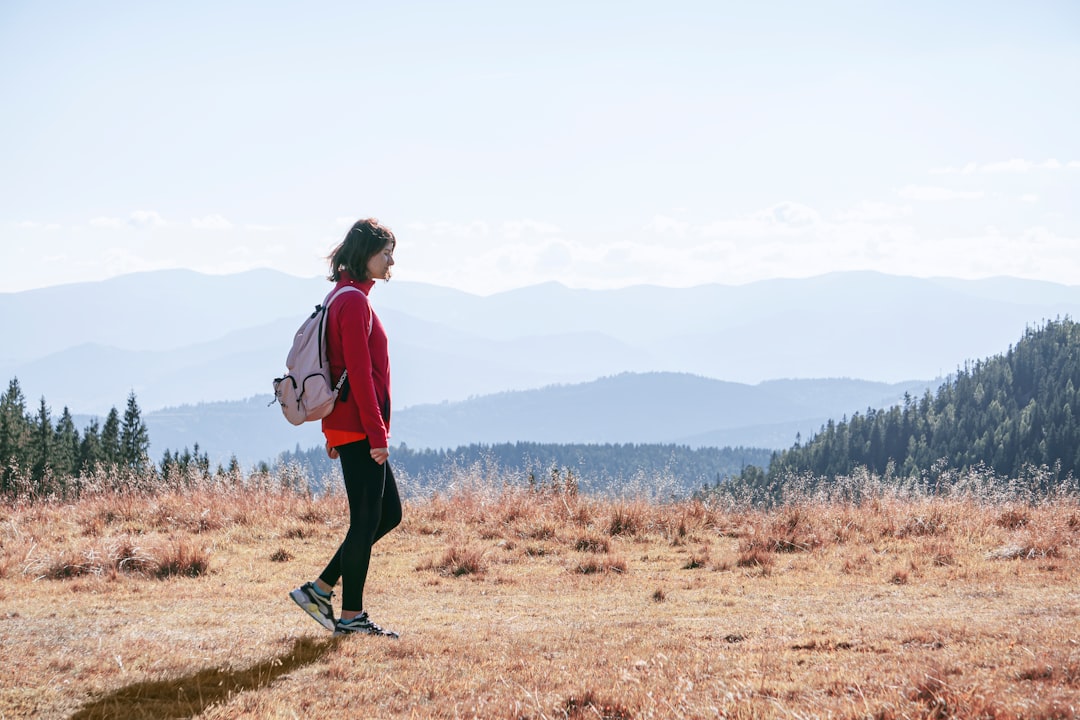Woman walking briskly outdoors as part of a walking speed longevity test