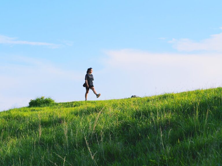 Active older woman running outdoors, representing klotho protein and healthy aging