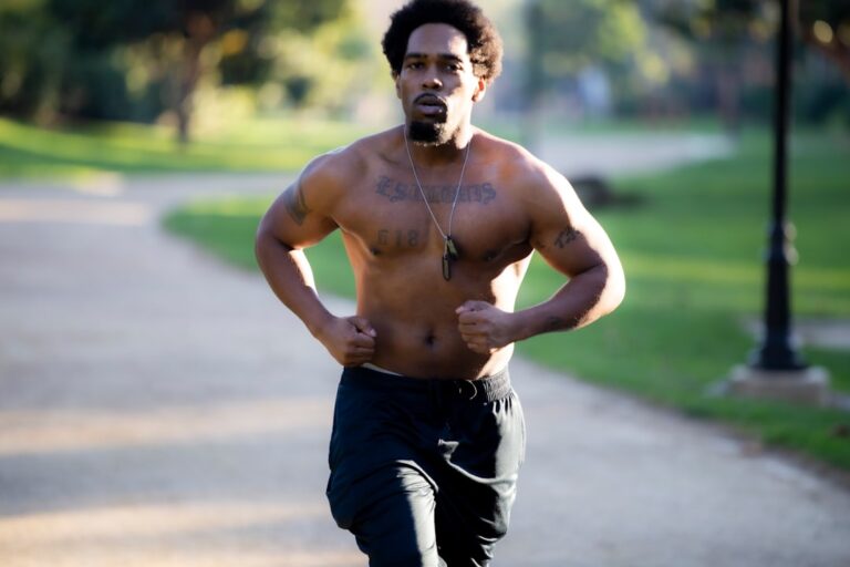 Active adult man exercising outdoors to support a healthy coronary calcium score and heart longevity