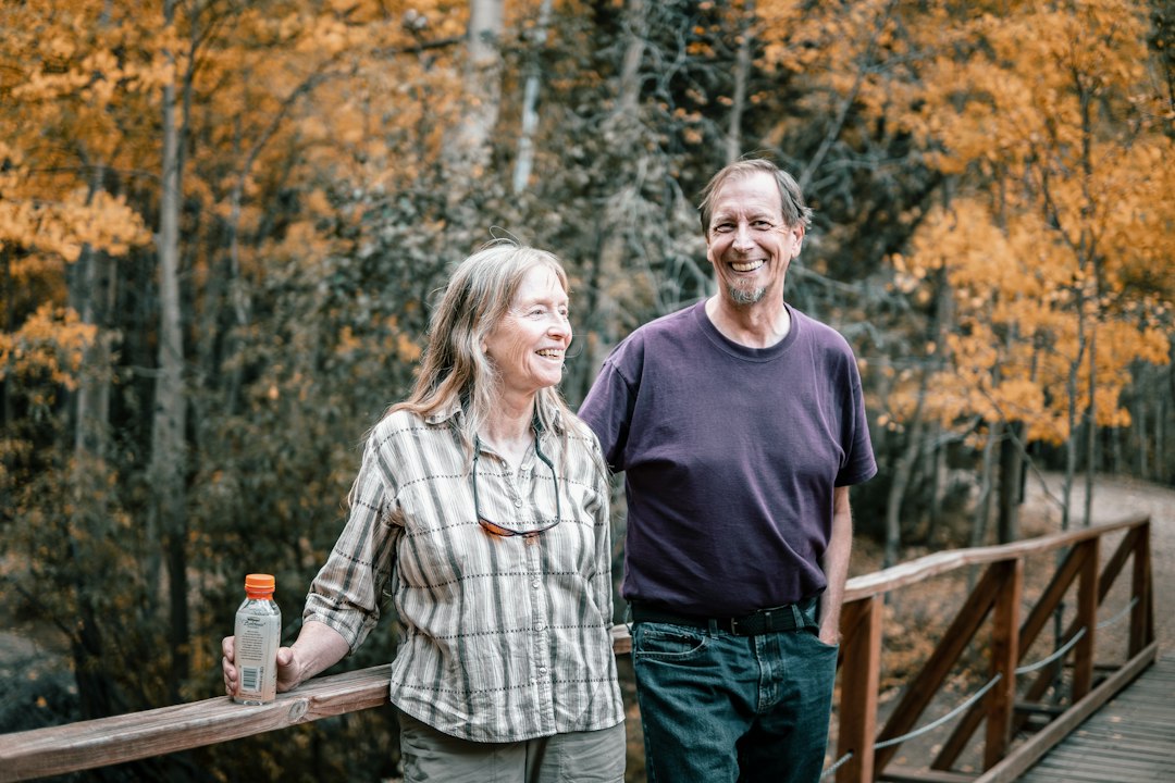 Older couple walking outdoors as a longevity budget health intervention