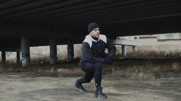 Fit man over 40 running outdoors as part of a longevity for men over 40 exercise routine