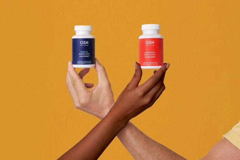 Supplement capsules on a wooden surface — comparing taurine vs berberine for longevity