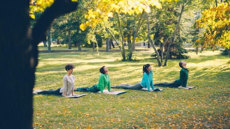Active woman stretching her knee outdoors, representing collagen supplements for joint health and mobility