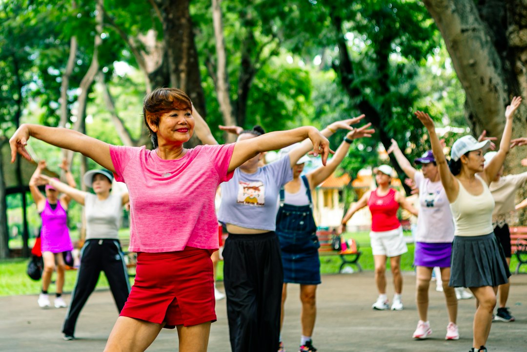 Active middle-aged adults exercising outdoors, representing SHBG and longevity optimization